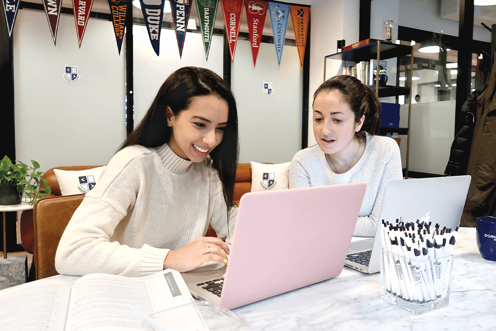 Student and Mentor working together on the students college application success