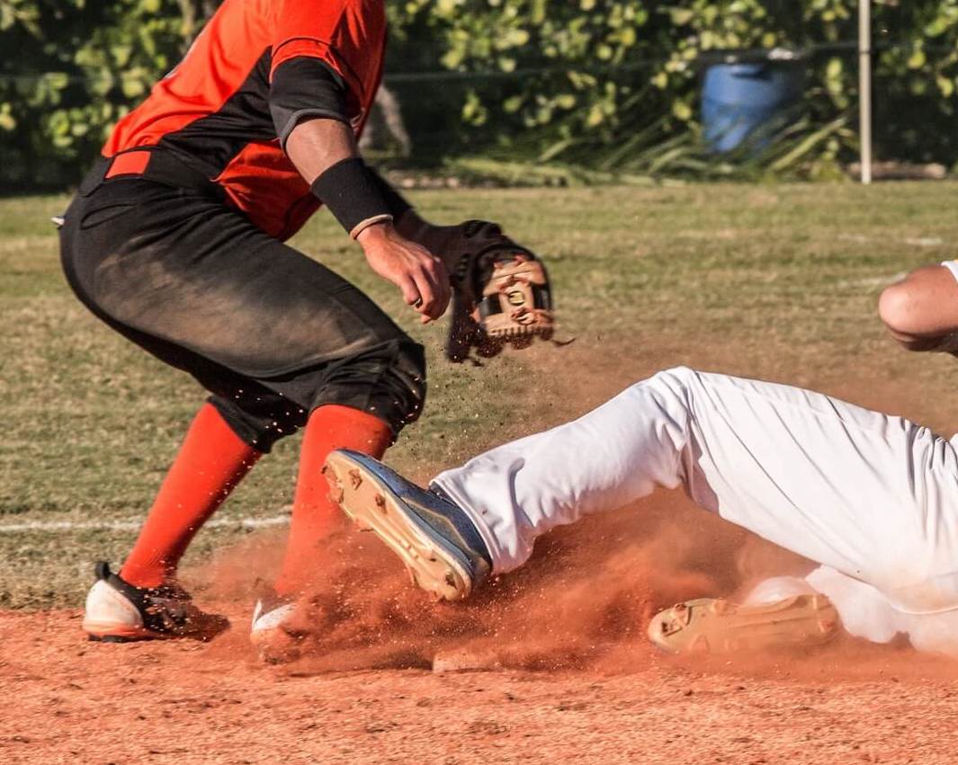 High School Students playing Baseball, Sliding into homebase