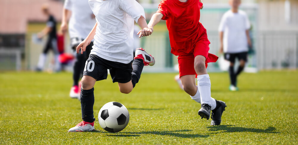 Students playing a game of Soccer | Command Education