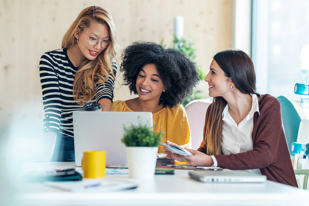 Group of women working together at