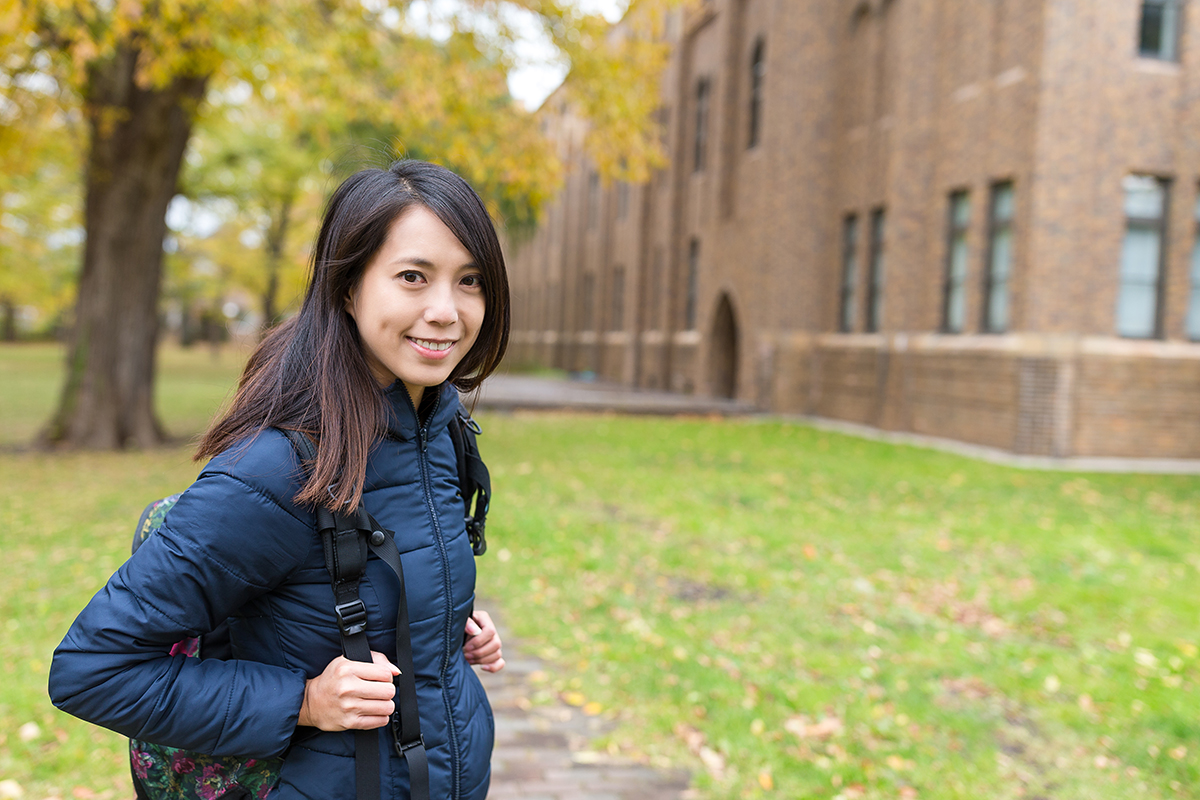 young woman on campus during a college visit