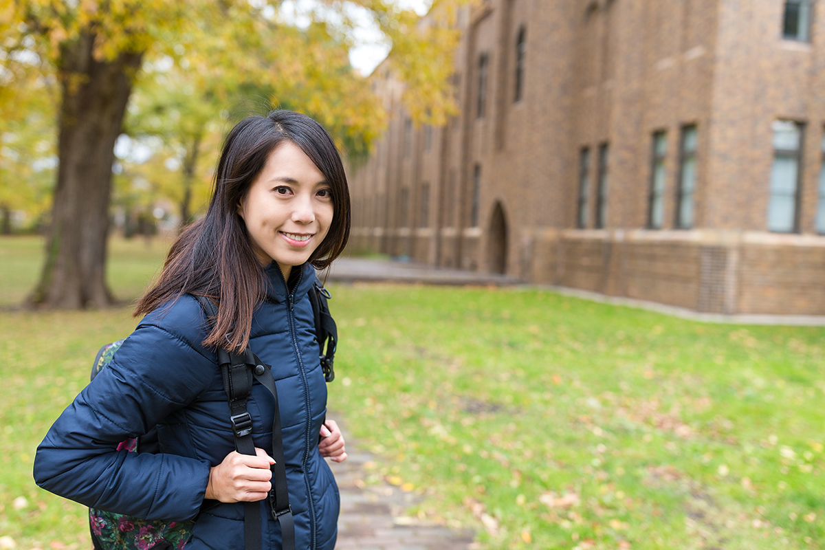 young woman on campus during a college visit