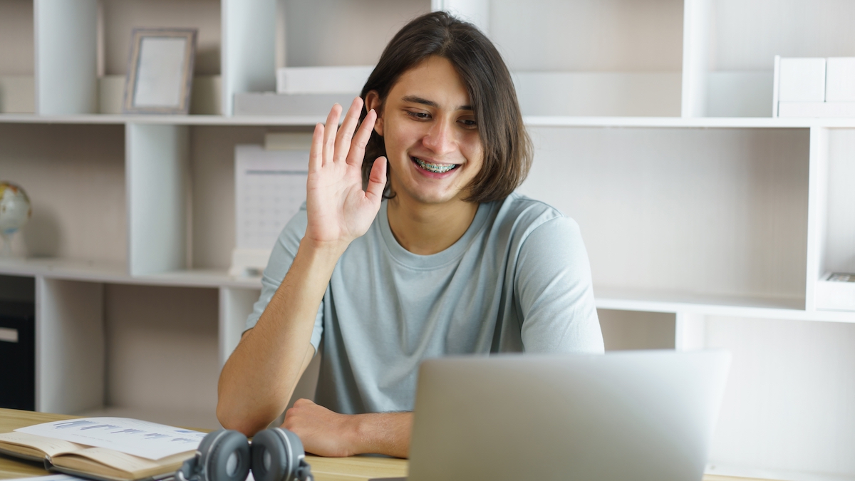 Happy graduate student with a certificate after graduation ceremony at the university.