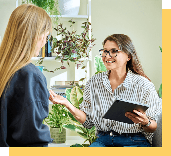 Photo of a student and mentor.