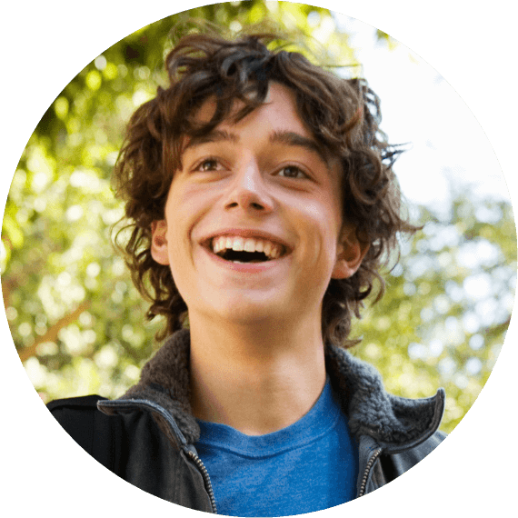 Image of a teenage boy smiling.