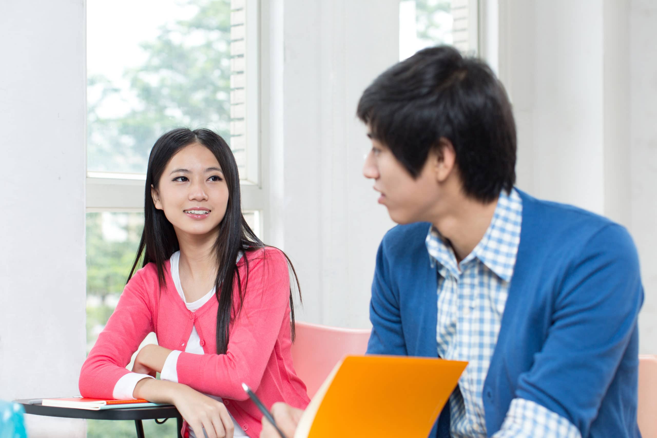 College students studying in classroom